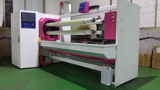 FOUR SHAFT TAPE CUTTING MACHINE FOR VARIOUS ROLL STOCK MATERIAL SUCH AS BOPP MASKING ETC.