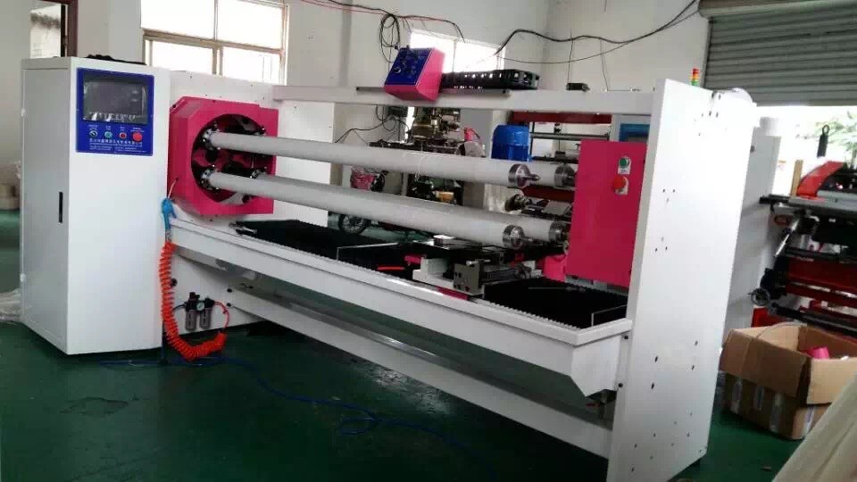 FOUR SHAFT TAPE CUTTING MACHINE